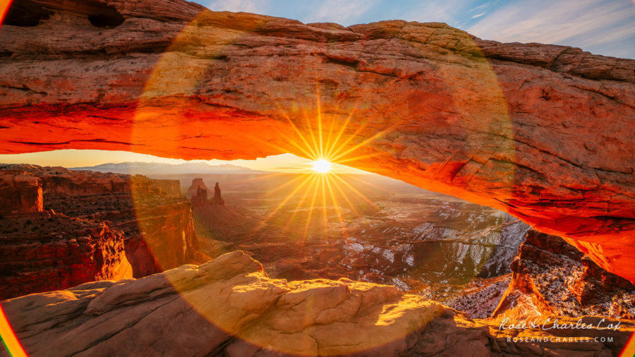 Photo of the Day – Sunrise at Mesa Arch with Lens Flares